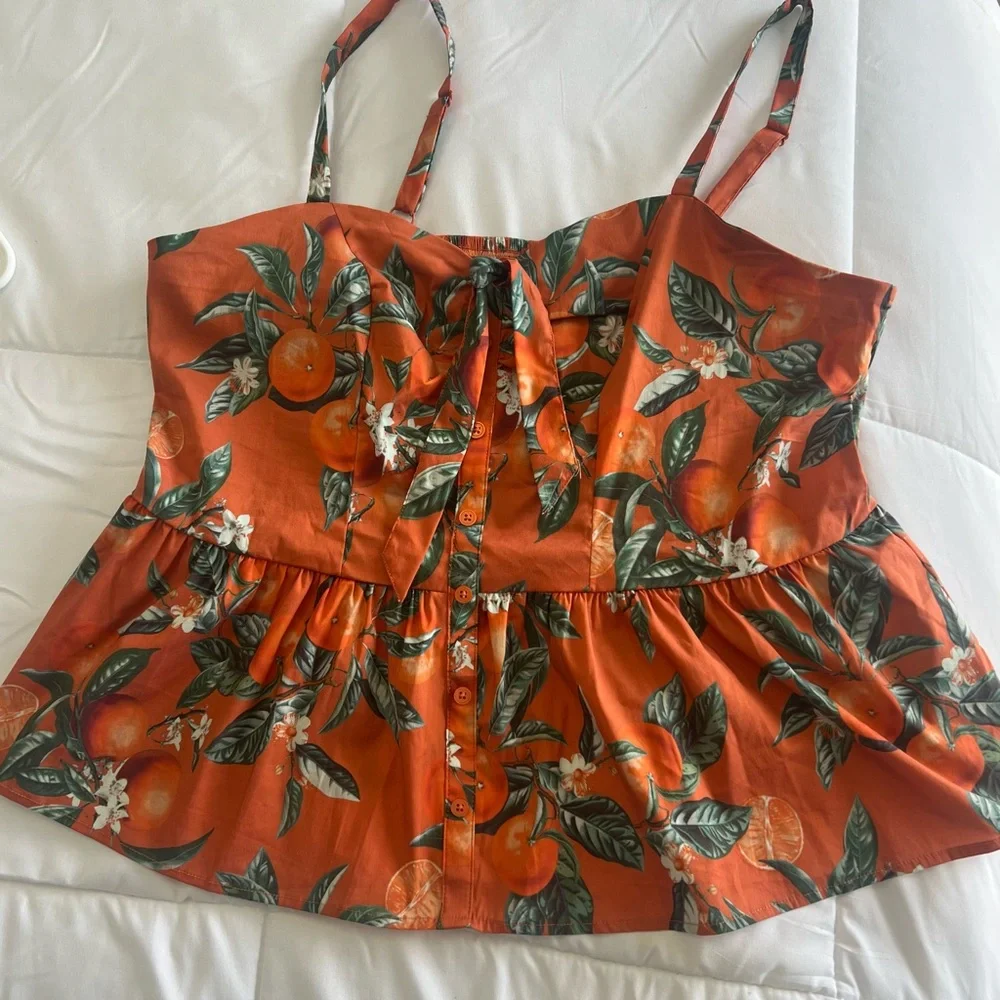 Torrid Orange Fruit themed Floral Peplum Top - Picture 1 of 4